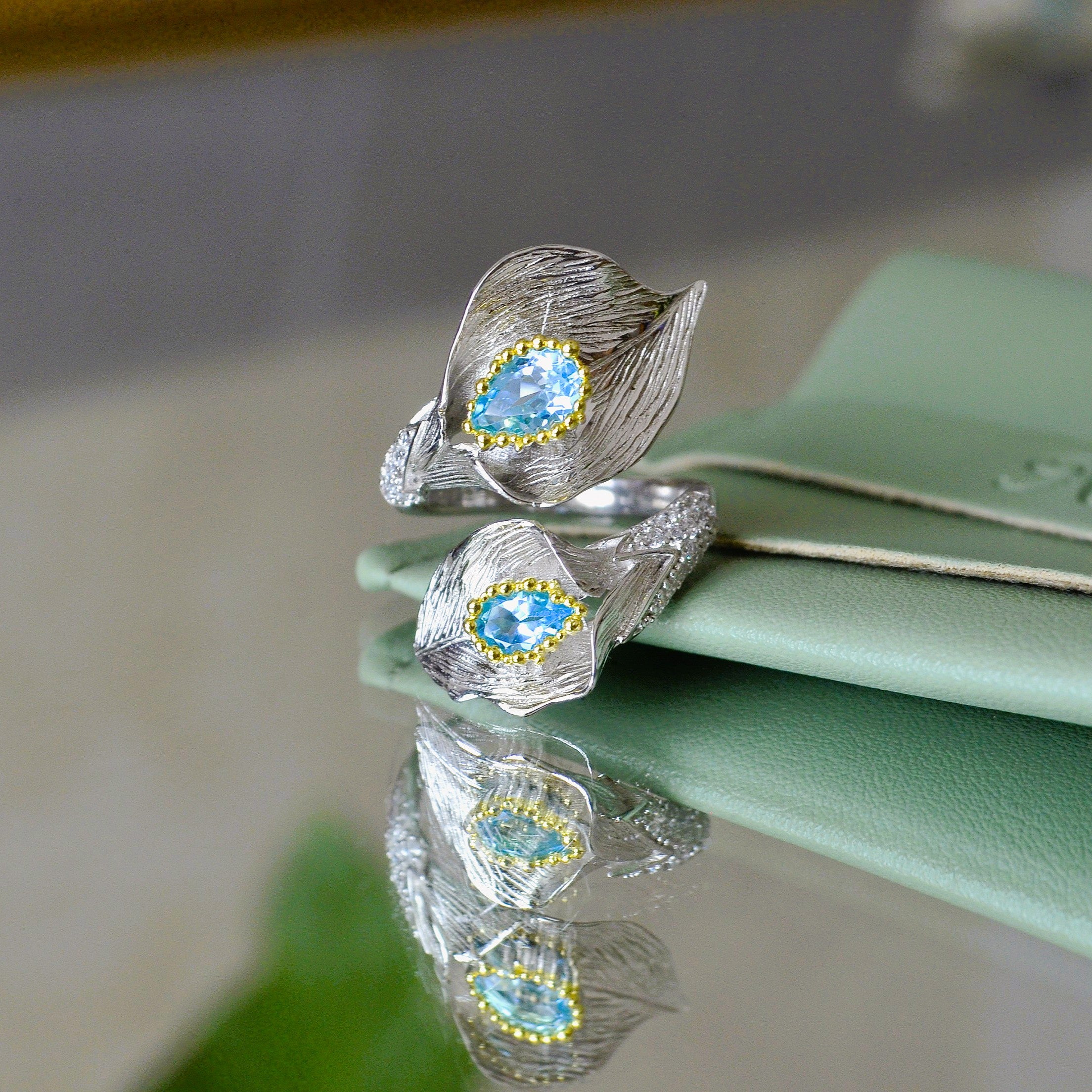 Inel din Argint 925 in flaore de lotus ce are piatra semipretioasa naturala Topaz, 04R01-0005 - Colectia Secret Garden - Bijuterii din argint 925 Reins