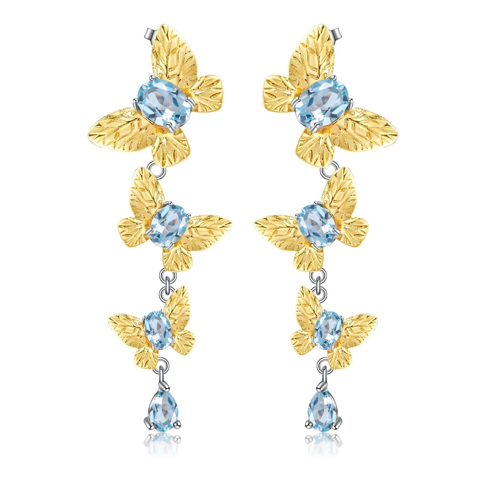 Cercei din Argint Reins in forma de fluture cu pietre semipretioase Topaz - Butterfly vedere pe fundal alb, 03R01-0008